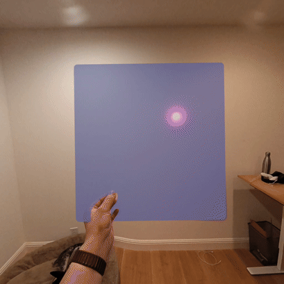 A pull gesture that anchors the app on a wall