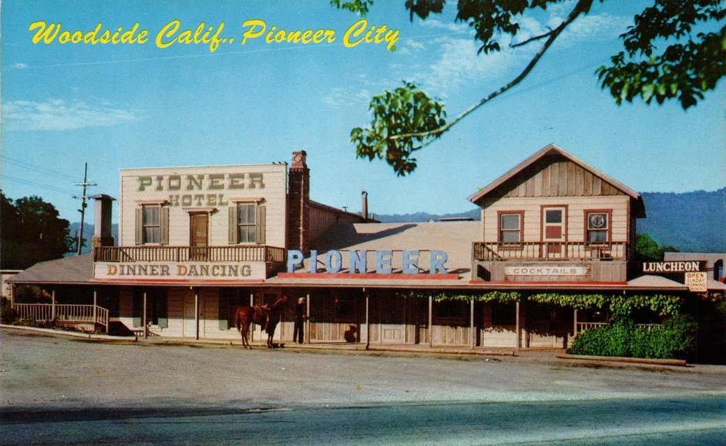 An old
postcard showing a saloon-looking building. You can read Pioneer Hotel,
Dinner Dancing, and Cocktails on the facade.