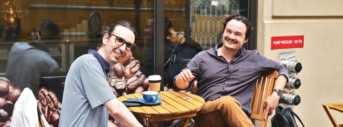 A
photo of Laurent and Michael in San Francisco, on the patio of a coffee
shop